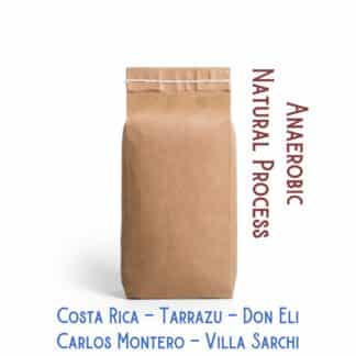 A coffee bag labeled, "Anaerobic Natural process Villa Sarchi produced by Carlos Montero at a farm called Don Eli which is in Tarrazu, Costa Rica."